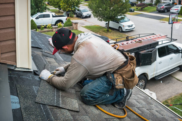 Professional Emergency Roof Repair technician working in Bellaire, MI